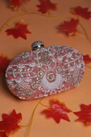 Embroidered oval clutch