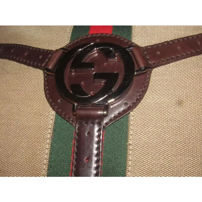 Gucci britt reins blondie, dark khaki canvas & brown leather, two handle, two-way- satchel or hobo style purse with an open top, red and green Sherry stripe and chrome GG accent