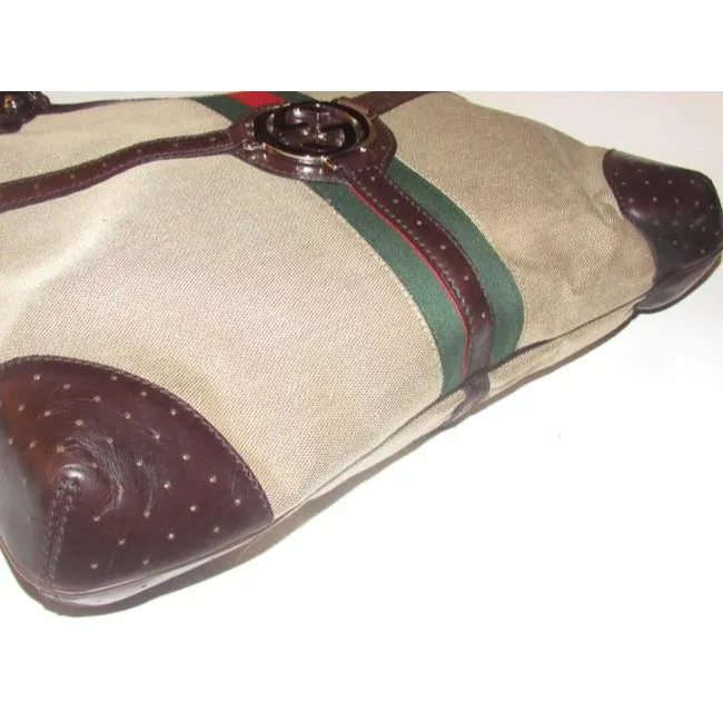Gucci britt reins blondie, dark khaki canvas & brown leather, two handle, two-way- satchel or hobo style purse with an open top, red and green Sherry stripe and chrome GG accent