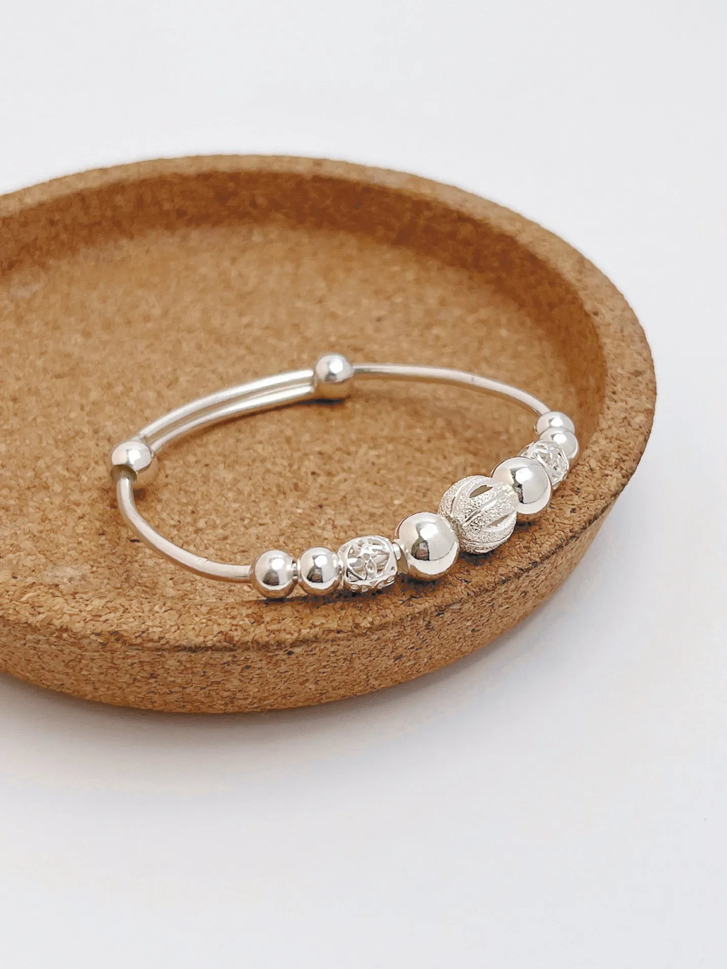 S999 Rolling Beads Baby Bangle